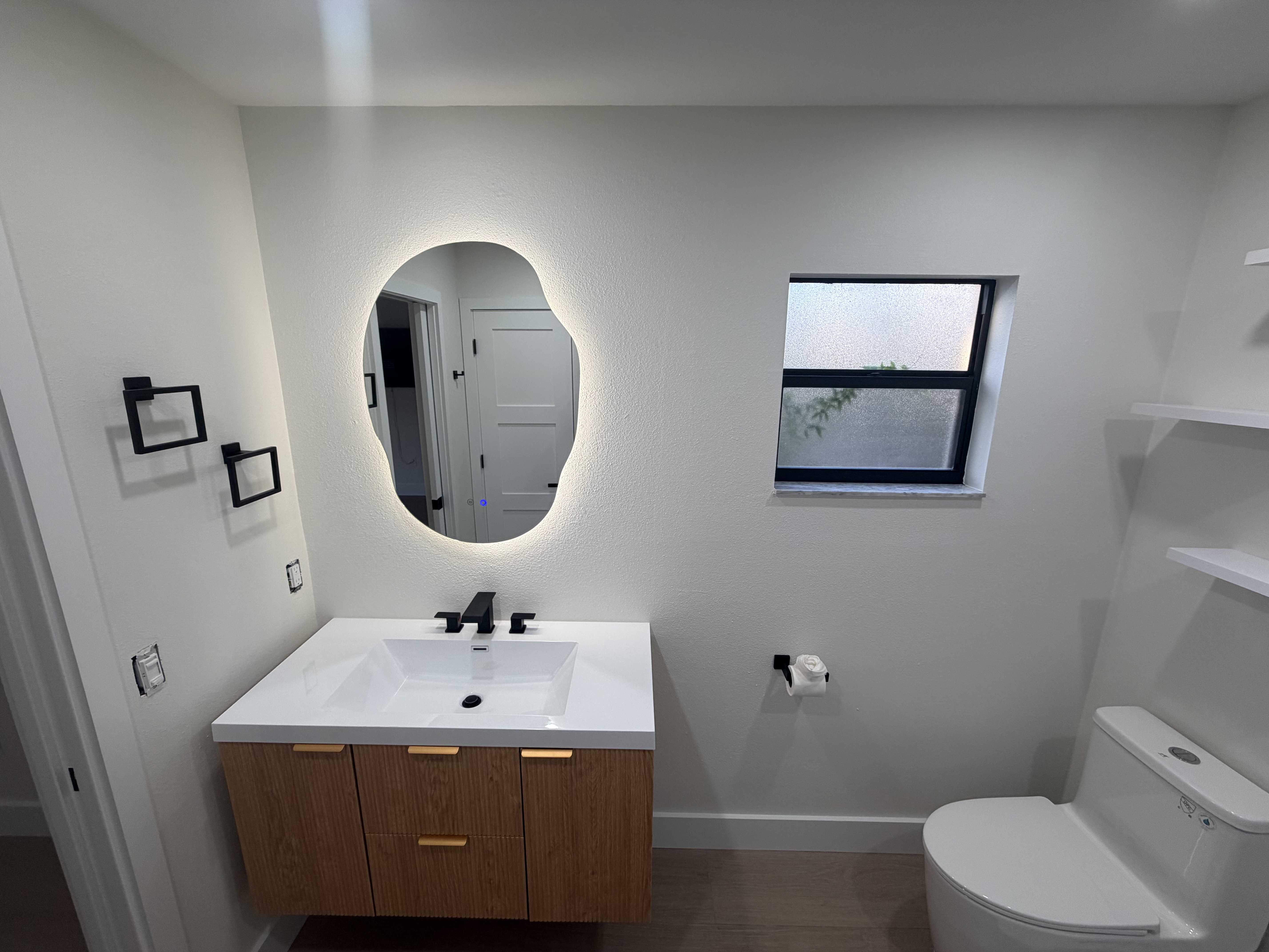 Bathroom remodel with finished tile and fixtures